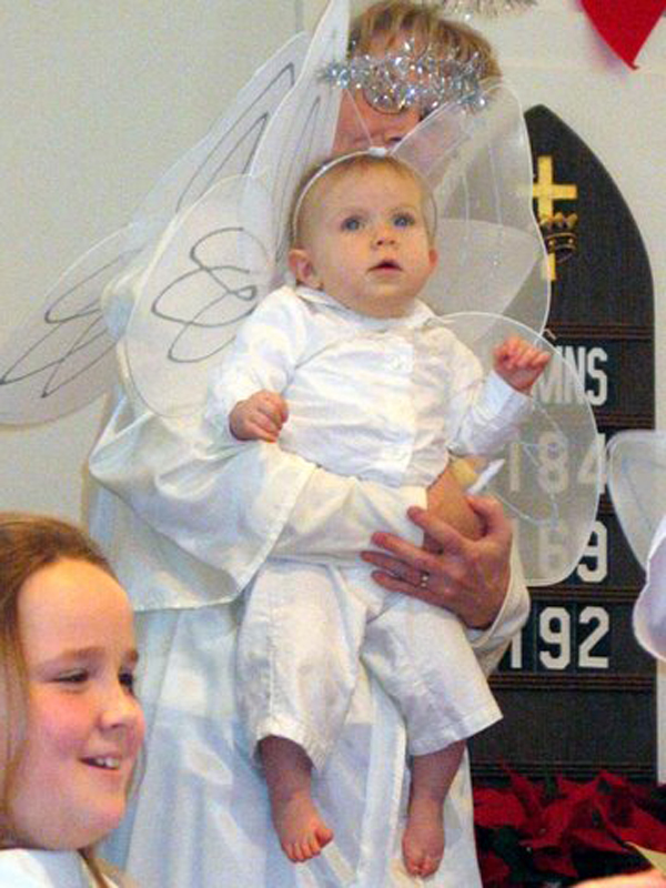 Angel Julia looks up in amazement